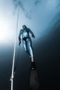 Freediver ascends from a depth Royalty Free Stock Photo