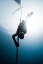 Freediver descending to the depth