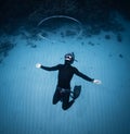 Freediver haves fun and blows the ring bubble