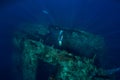 Freediver man dive at shipwreck, underwater Royalty Free Stock Photo