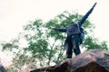 Freedom african man traveler standing on the top of the cliff and with backpack Royalty Free Stock Photo