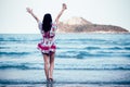 Freedom Asian smile woman in summer vintage dress on beach Royalty Free Stock Photo