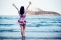 Freedom Asian smile woman in summer vintage dress on beach