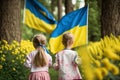 Freedom in Bloom: Children Walking with Ukrainian Flags through a Yellow Flower Field as a Symbol of Hope