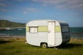 Freedom camping in caravan at an East Coast beach, Gisborne, North Island, New Zealand