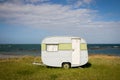 Freedom camping in caravan at an East Coast beach, Gisborne, North Island, New Zealand