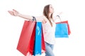 Freedom concept with beautiful shopaholic standing with arms wide open Royalty Free Stock Photo