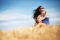 Freedom concept. Beautiful woman enjoying summer sun in the field Royalty Free Stock Photo