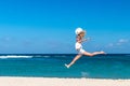 Freedom concept. woman on a beach of Bali island. She is enjoying serene ocean nature during travel holidays Royalty Free Stock Photo