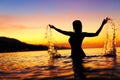 Freedom, Enjoyment. Woman In Sea At Sunset. Happiness, Healthy L Royalty Free Stock Photo