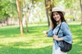 Freedom and Finding Concept: Casual cute smart Asian women walking in the park Royalty Free Stock Photo