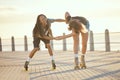 Freedom, fun and happy couple laughing and roller skating outdoors together, positive, playful and cheerful. Excited Royalty Free Stock Photo