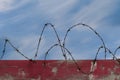 Freedom motivational inspiring quote and landscape with barbed wire fence background