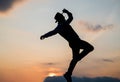 freedom. personal achievement goal. man dancer silhouette jump and dance on sky background.