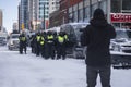 Freedom protestor in Ottawa confronts police before they march