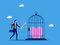Freedom in savings and investments. Businessman uses a key to open a piggy bank in a cage. business concept Royalty Free Stock Photo