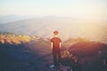 Freedom traveler man standing with Mountain vintage tone soft focus