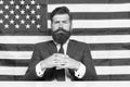 Without freedom you are nothing. American man. Bearded man on usa flag background. Serious look of brutal man. Patriotic