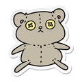 freehand drawn sticker cartoon of a cute stiched up teddy bear