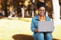 Freelance Career. Black Girl Using Laptop Working Online Sitting Outside