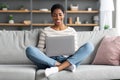 Freelance Career. Young Smiling Black Lady Working With Laptop At Home