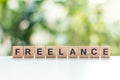 Freelance message sign made of wooden cubes Royalty Free Stock Photo