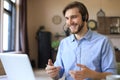 Freelance operator talking with headsets and consulting clients from home office Royalty Free Stock Photo