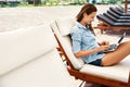 Freelance Work. Business Woman Using Computer On Beach. Online Work Royalty Free Stock Photo