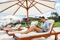 Freelance Work. Business Woman Using Computer On Beach. Online Work Royalty Free Stock Photo