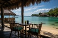 Freelance work with stunning ocean view and tropical cocktail on the table by the sea