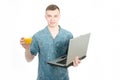 Freelance. Young man working at a computer. Royalty Free Stock Photo