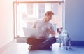 Freelancer man using laptop computer and cup of coffee Royalty Free Stock Photo