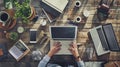 Freelancer Managing Multiple Tasks on Tablet