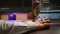 Freelancer programming binary code on software server Royalty Free Stock Photo