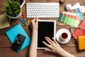 Freelancer sitting at desk and tablet computer Royalty Free Stock Photo