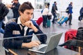 Freelancer working with a laptop in train station Royalty Free Stock Photo