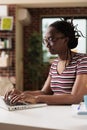 Freelancer working, remote copywriter typing on laptop keyboard