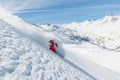 Freeride skier going fast downhill Royalty Free Stock Photo