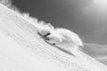 Freeride skier going fast downhill Royalty Free Stock Photo