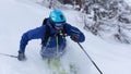 Freeride skier skiing in deep powder snow Royalty Free Stock Photo