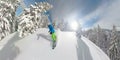 Freeride snowboarder riding fresh powder snow in snowy backcountry wilderness Royalty Free Stock Photo