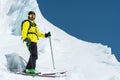 A freerider skier in complete outfit stands on a glacier in the North Caucasus Royalty Free Stock Photo