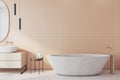 Freestanding bath with mirror in modern bathroom Royalty Free Stock Photo