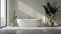 The freestanding bathtub stands elegantly on a concrete pedestal inviting you to relax and unwind in the minimalist Royalty Free Stock Photo