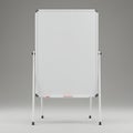Freestanding whiteboard with a rectangular shape, positioned on a tripod stand. The Royalty Free Stock Photo