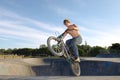 Freestyle BMX rider doing a trick