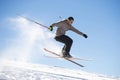 Freestyle ski jumper with crossed skis Royalty Free Stock Photo