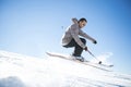 Freestyle ski jumper with crossed skis Royalty Free Stock Photo