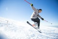 Freestyle ski jumper with crossed skis Royalty Free Stock Photo