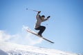 Freestyle ski jumper with crossed skis Royalty Free Stock Photo